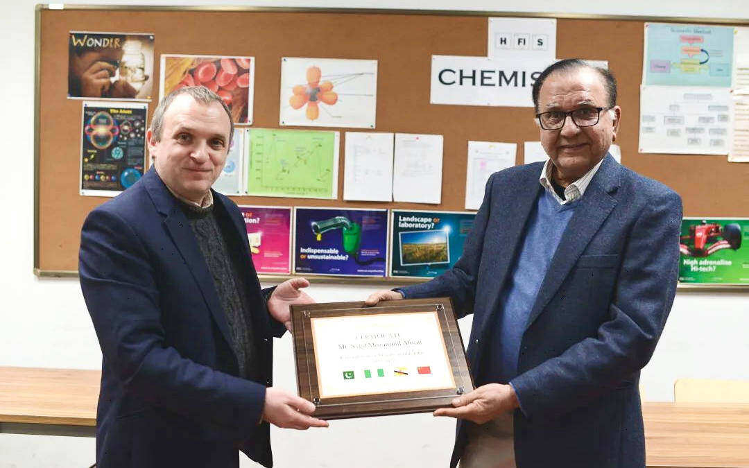 Syed Mozammil Ahsan receives a certificate